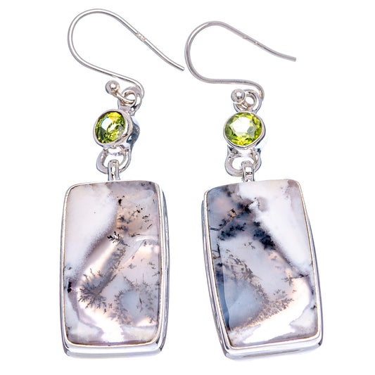 Sterling silver drop earrings with green peridot tops and rectangular dendritic opal pendants
