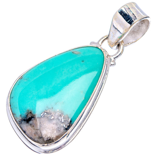 Sterling silver turquoise teardrop pendant, visible bezel and bail from side angle