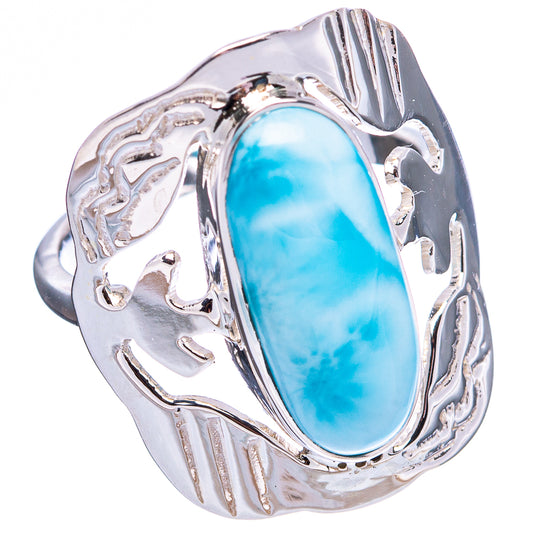 Oval blue larimar cabochon sterling silver ring with ornate engraved metal band