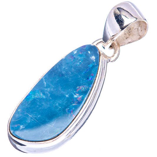 Sterling silver opal pendant with elongated teardrop blue cabochon and bail