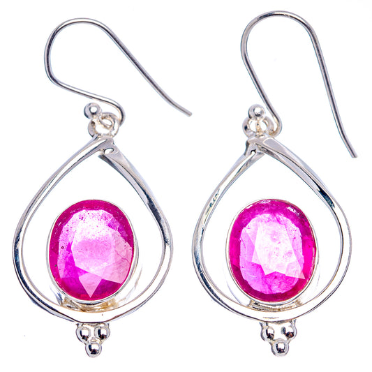 Teardrop ruby-red glass earrings with sterling silver hooks and looped frames, pair