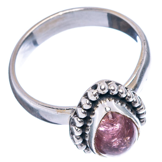 Sterling silver ring with pink tourmaline cabochon in beaded side setting