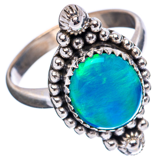 Sterling silver opal ring with large blue oval cabochon and raised bead border