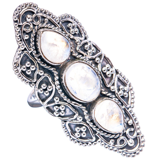 Sterling silver moonstone ring with three oval iridescent stones, decorative scrolling bezel