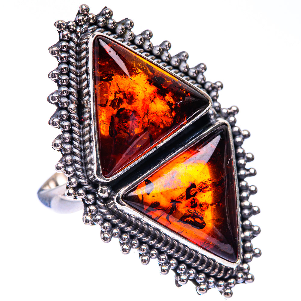 Triangular amber ring with orange-red stones and silver bead frame, two large triangles