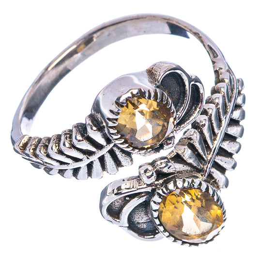 Adjustable .925 sterling silver ring with two faceted oval citrine stones, side view