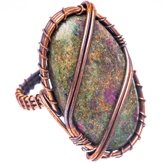 Oxidized copper wire ring featuring an oval mottled green fuchsite stone