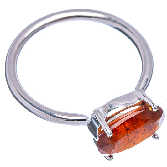 Orange kyanite gemstone ring with silver band, oval cut setting with prongs