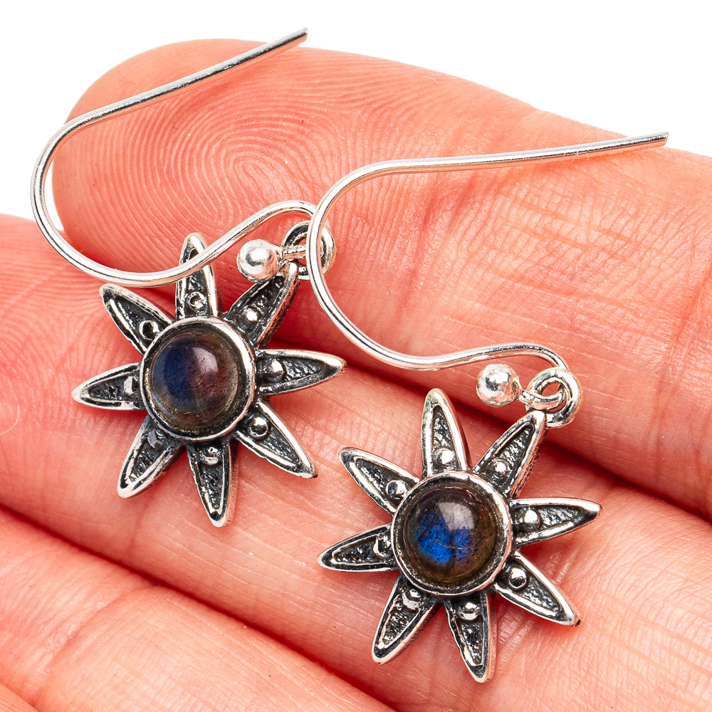 Dainty sterling silver star earrings with dark blue labradorite round stones