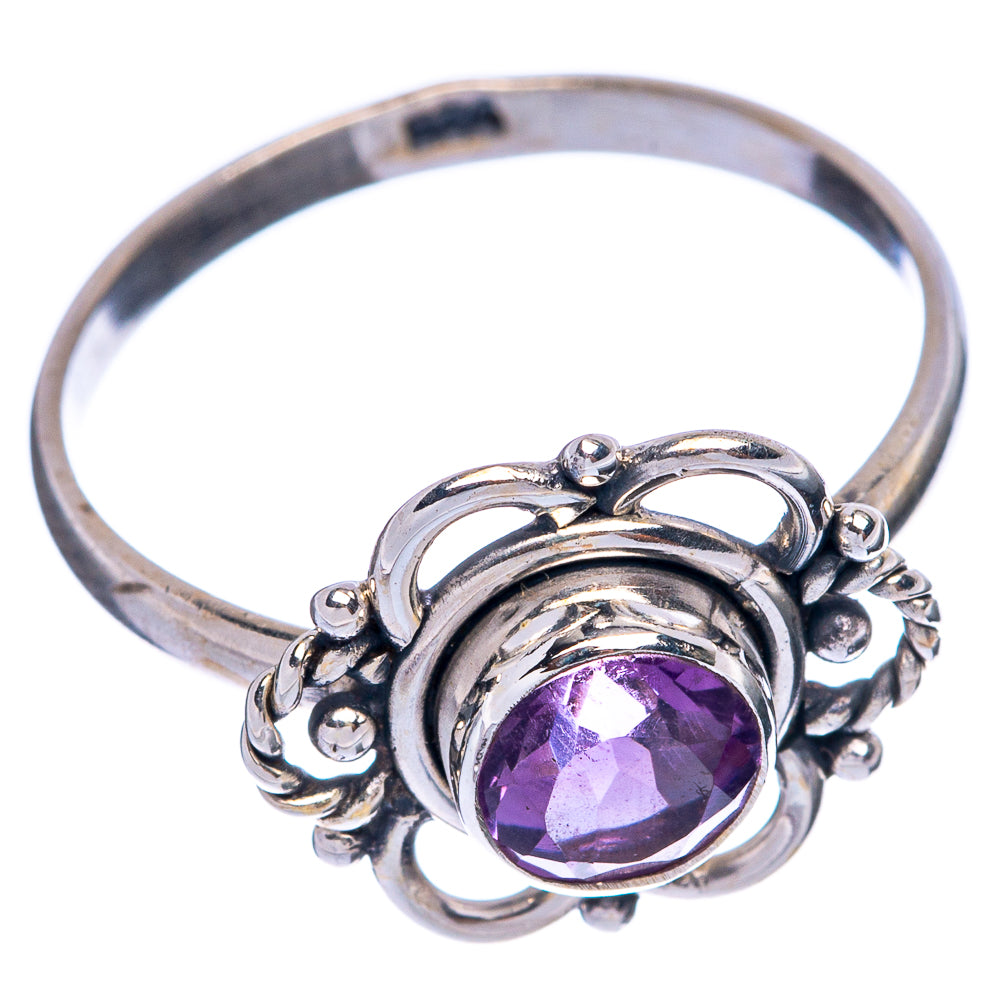 925 sterling silver ring with purple faceted amethyst center and curled filigree side details