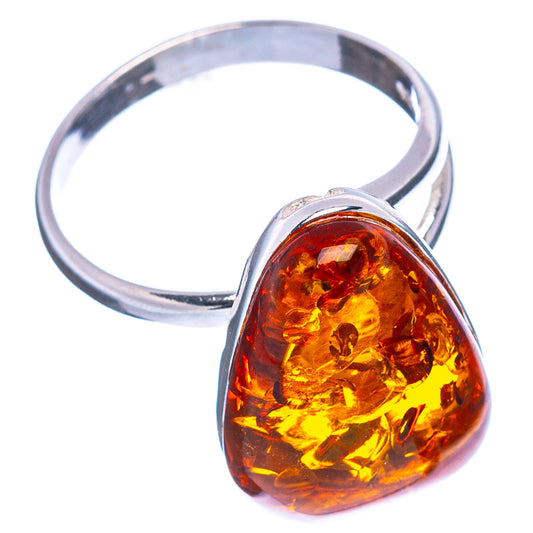 Amber heart cabochon ring with polished .925 sterling silver band, adjustable, size 7