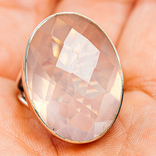 Oval faceted rose quartz ring with bezel setting and sterling silver band