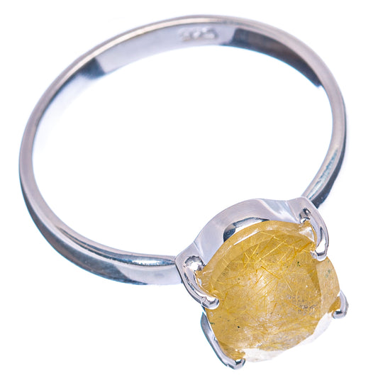 Rutilated quartz ring with .925 sterling silver band, oval yellow stone in four prongs