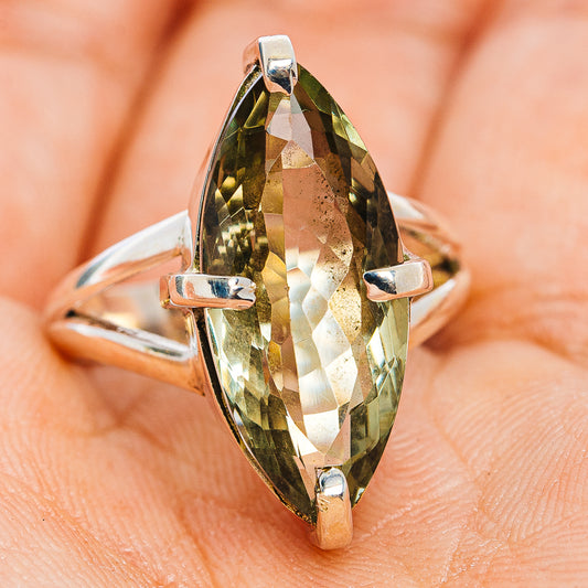 Oval green amethyst faceted gemstone ring with sterling silver prong setting, front view