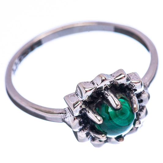 Sterling silver malachite ring, green cabochon with black cluster prongs