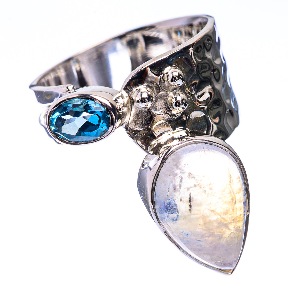 Sterling silver ring with blue oval gemstone, moonstone teardrop, and raised bubble texture