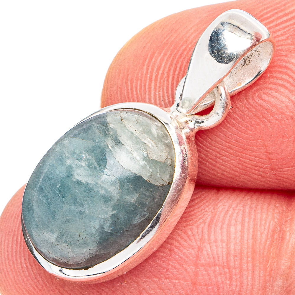 Aquamarine oval pendant in 925 sterling silver bezel with hinged bail