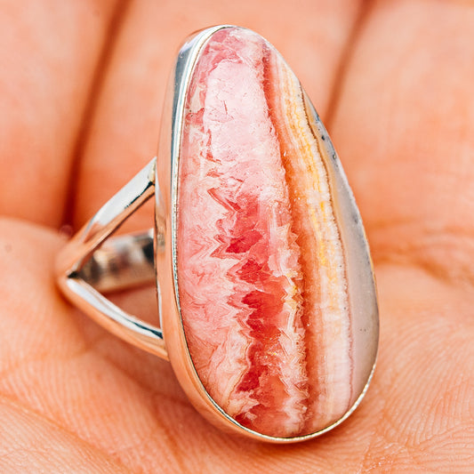 Sterling silver ring featuring large oval rhodochrosite cabochon with marbled pink