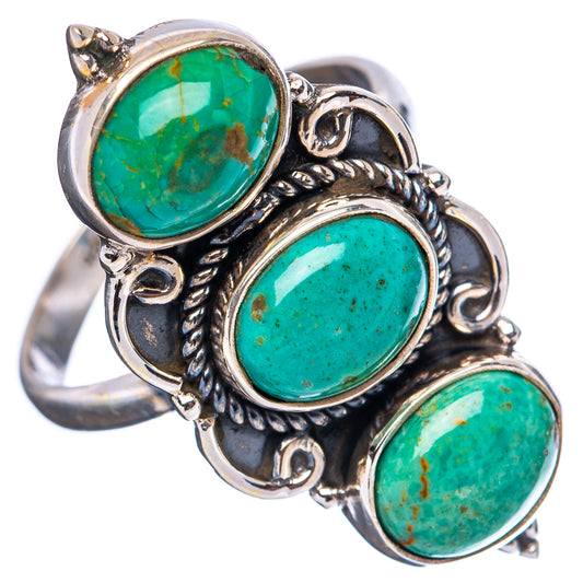Adjustable .925 sterling silver turquoise ring with three oval turquoise cabochons, scrollwork