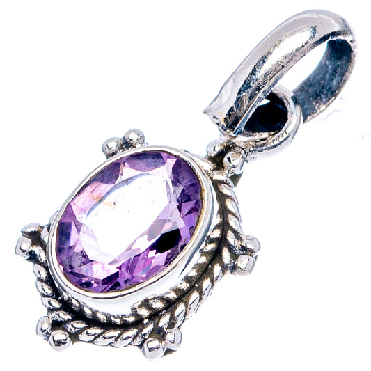Amethyst oval pendant with sterling silver top loop, prongs, and decorative beadwork