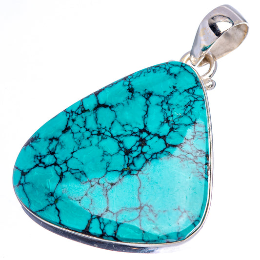 Large teardrop turquoise pendant with silver frame and bail, stone with dark veins