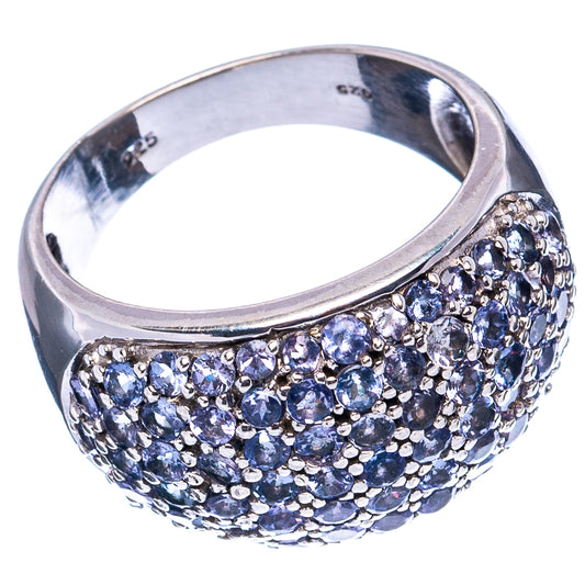 Sterling silver ring with wide band, blue gemstone cluster and pave detail