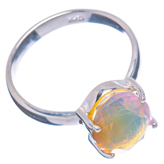 Sterling silver ring featuring an oval iridescent opal on a raised bezel