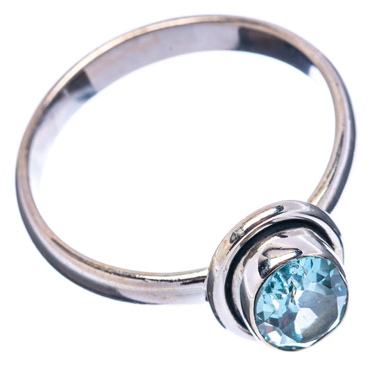 Sterling silver blue topaz ring, oval stone in round bezel on band, size 8.5