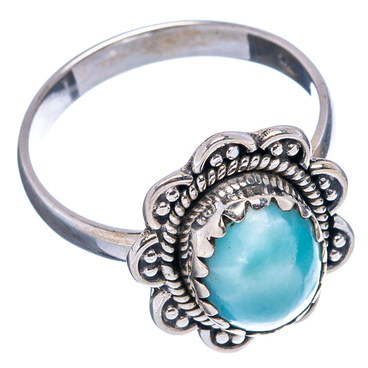 Sterling silver larimar cabochon ring with ornate scalloped bezel and blue oval stone