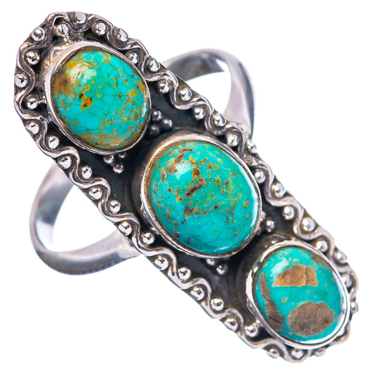 Sterling silver turquoise ring featuring three oval cabochons on raised prongs