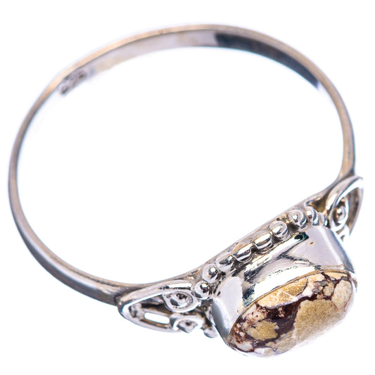 Sterling silver ring with ornate side scrollwork and oval wild horse jasper centerpiece