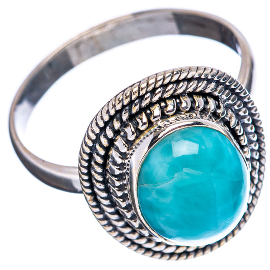 Ornate .925 sterling silver ring with oval larimar stone and detailed band
