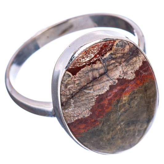 Sterling silver ring with oval rhyolite cabochon, red-brown and gray-green tones
