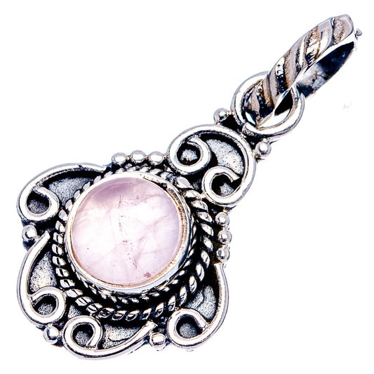 Sterling silver rose quartz pendant with round pink cabochon and linked bail