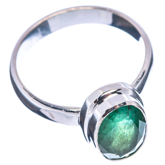 Oval green emerald ring with raised bezel and .925 sterling silver band