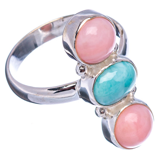 Sterling silver ring with pink oval gemstone and turquoise oval center stone
