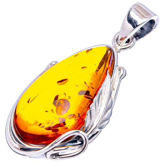 Amber teardrop pendant with yellow-orange Baltic amber in .925 sterling silver frame