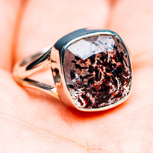 Sterling silver ring with oval faceted dark stone, size 7.75