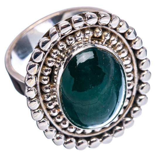 Green oval cabochon sterling silver ring with beaded halo and wide bezel, adjustable