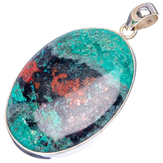 Oval .925 sterling silver pendant with turquoise and black mottled stone, silver bail detail