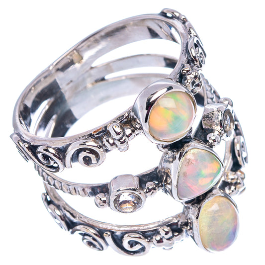 Sterling silver opal ring, oval iridescent stones on a decorative band with round crystal