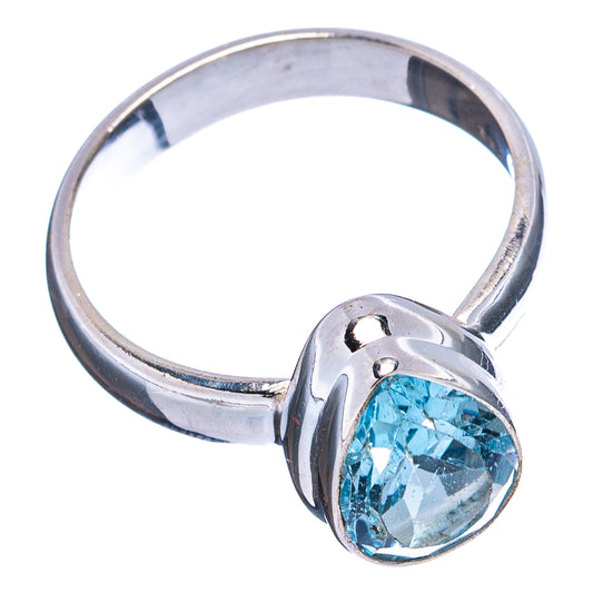 Oval faceted blue topaz ring in polished .925 sterling silver, open bezel setting.