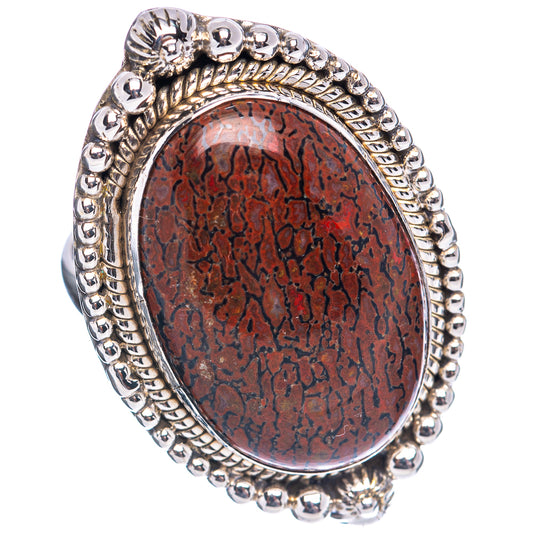 Sterling silver oval dinosaur bone pattern ring with rope and bead bezel details