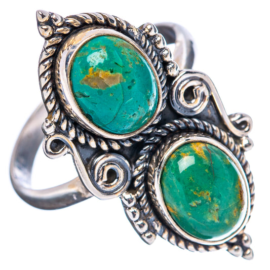 Adjustable sterling silver ring with oval turquoise cabochon pair and ornate bezel