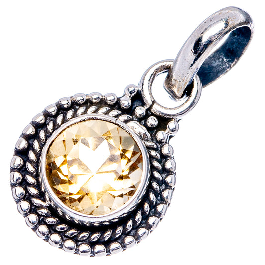 Sterling silver citrine pendant with round faceted yellow stone in ornate beaded teardrop frame