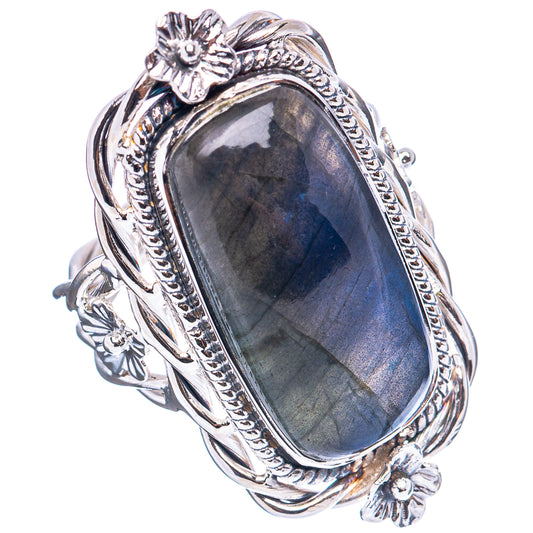 Sterling silver ring with oval blue labradorite gemstone and detailed floral sidework