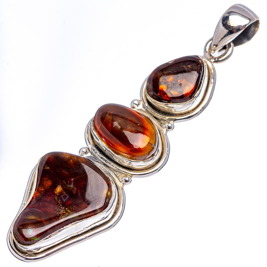 Sterling silver fire agate pendant with three oval brown-orange stones and top bail