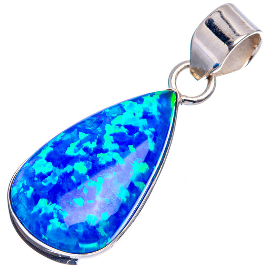 Sterling silver teardrop pendant with bright blue lab opal centerpiece and loop bail.