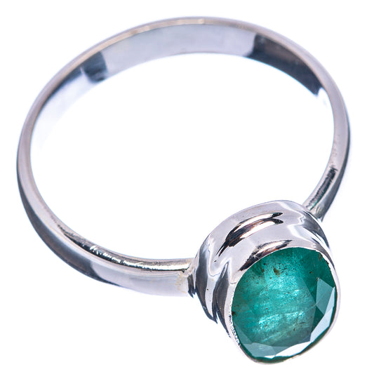 Sterling silver emerald ring with oval faceted green gemstone, raised bezel