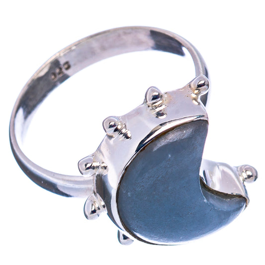 Sterling silver moon ring with blue cabochon, raised setting and open back band